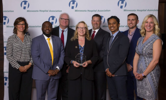 North Memorial Health employees with the award from the Minnesota Hospital Association