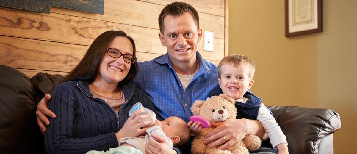 mom and dad with 2 kids