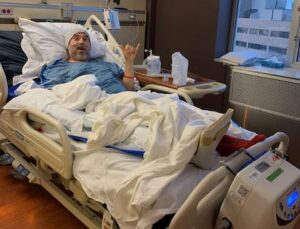 Steve in a hospital bed at North Memorial Health