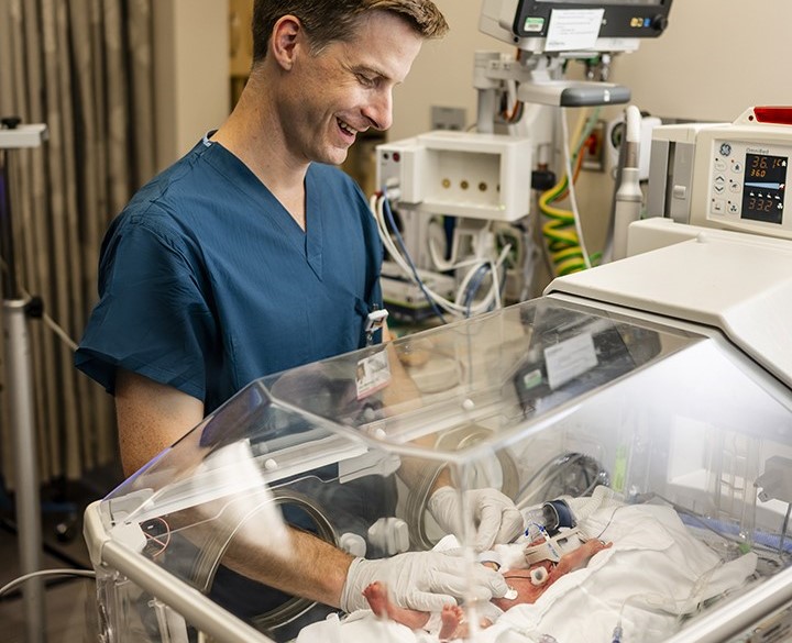 NICU doctor with baby