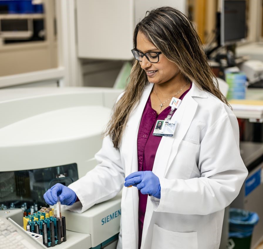 NMH MGH team member in lab