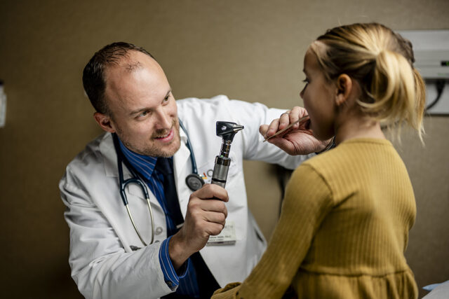 Provider with pediatric patient