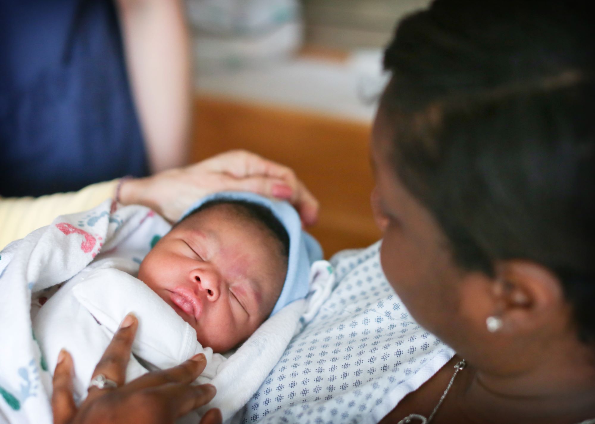 New mother with newborn baby