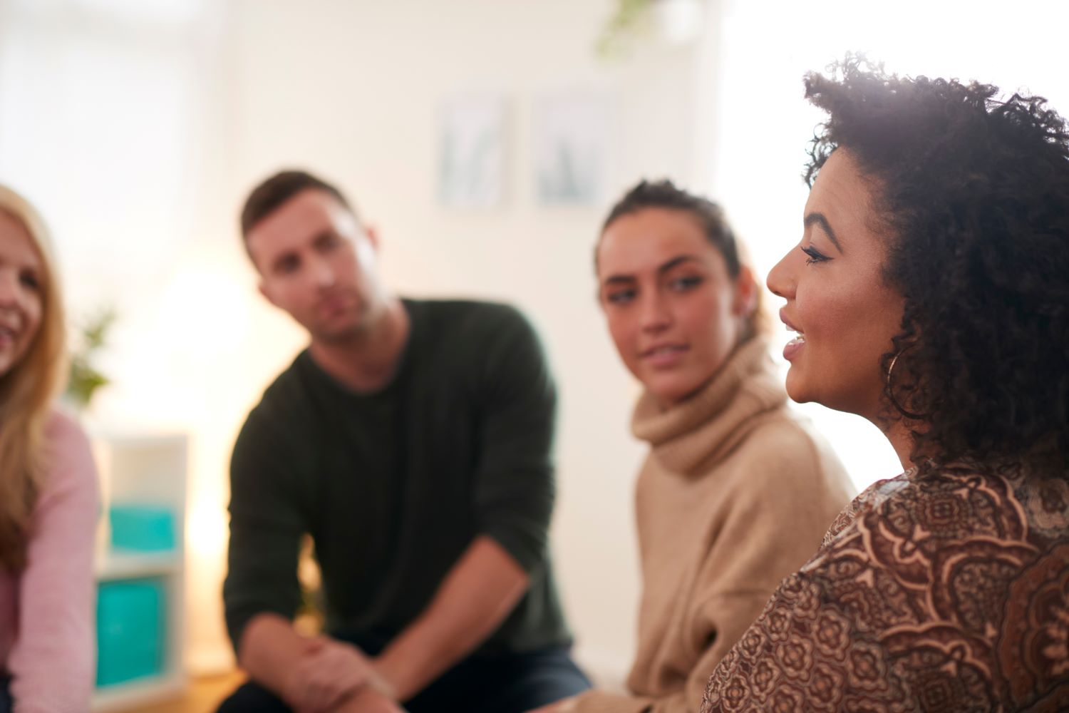 Woman Speaking at Group Meeting